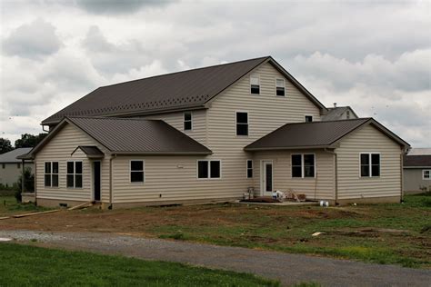 burnished slate metal on tan house|burnished slate metal roof.